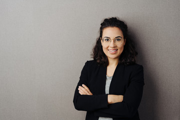 Stylish young woman with confident friendly smile