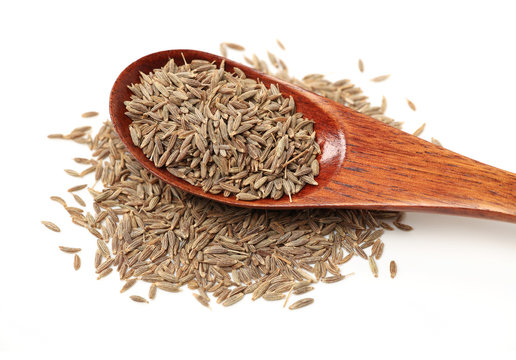 cumin seeds on white background