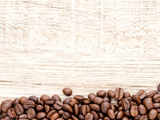 Coffee on wooden background.