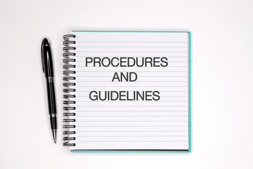 Procedures and guidelines text on note pad - Business concept