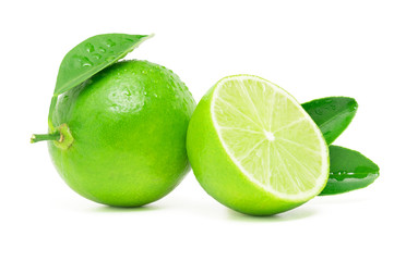Fresh lime cut sliced with green leaf and water drop isolated on white background with clipping path