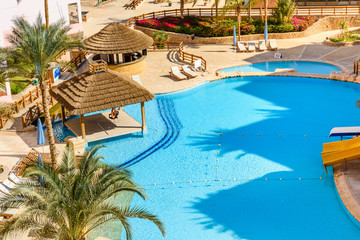 View on a swimming pool in hotel resort
