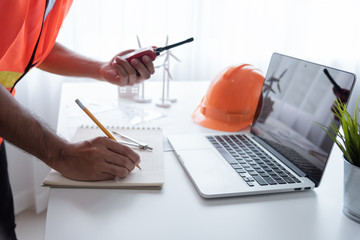 Construction engineer working Planning for a New Project on table in meeting room