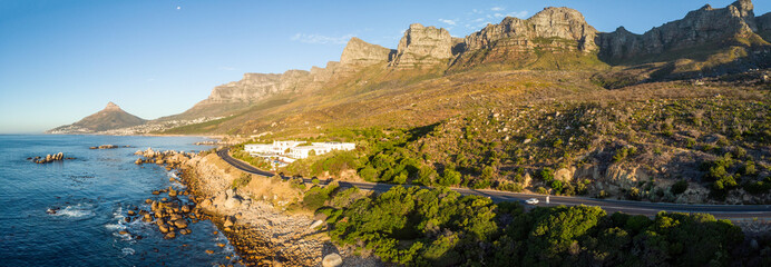 Beach at sunset in Cape Town South Africa with cliffs and mountains