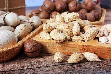 Nuts on a wooden plate
