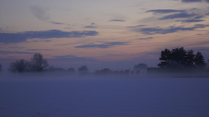 Obraz na płótnie Canvas Sunset and Blizzard Lincolnshire Fens