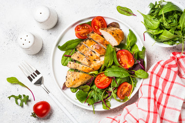 Chicken fillet with salad top view.