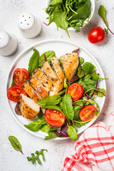 Chicken fillet with salad top view.