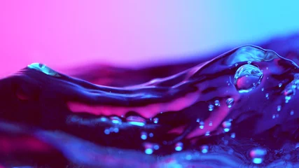 Foto op Plexiglas Detail of water waves in neon lights © Jag_cz