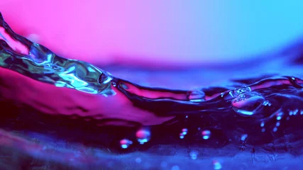 Fotobehang Detail van watergolven in neonlichten © Jag_cz