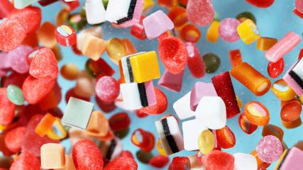 Flying sweet candies up in the air