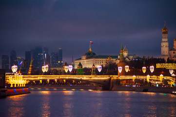 Fototapeta na wymiar Moscow, Russia - January 03, 2020: View of the Moscow Kremlin and the Moskva river in the evening with Christmas illumination.