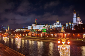 Moscow, Russia - January 03, 2020: View of the Moscow Kremlin, Moscow river and Kremlin embankment at the Christmas illuminations at night.