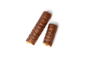 Shortbread stick with caramel in chocolate isolated on white background.