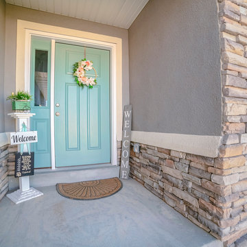 Square Green Painted Front Door To A Suburban House