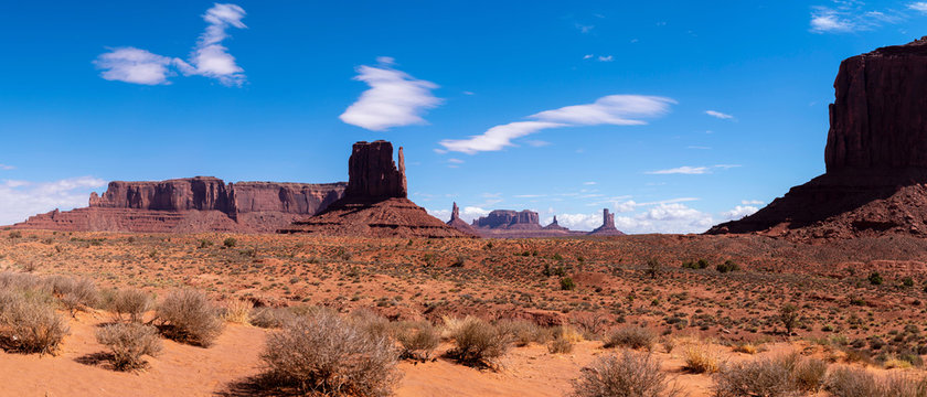 colorful monument valley landscape with mountains on a sunny day, utah, arizona