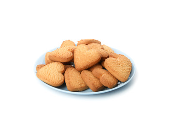 Plate with heart shaped cookies isolated on white background
