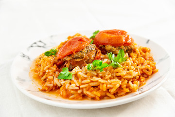 Stuffed tomatoes and rice with tomato