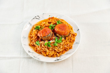 Stuffed tomatoes and rice with tomato