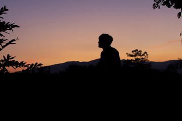 The silhouette of the dark evening sky