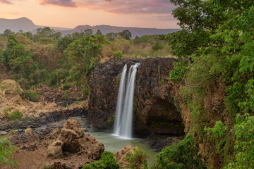 sunset on Blue Nile waterfall in dry season with low water flow near Bahir Dar and Lake Tana. Nature and travel destination. Amhara Region Ethiopia, Africa wilderness