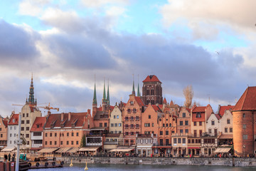 Fototapeta premium Gdansk city promenade in poland with beautiful old buildings and ships in winter