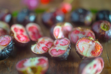 Fototapeta na wymiar Close up slices of wild berries.