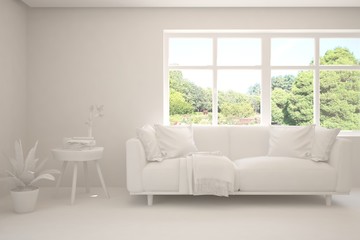 Mock up of stylish room in white color with sofa and green landscape in window. Scandinavian interior design. 3D illustration