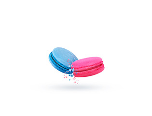 Blue and pink macaroon cookies in motion falling on a white background. Sweet and colorful french pasta falling or flying in motion.