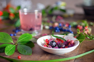 Colorful berries on wooden table