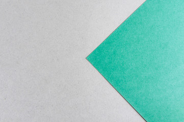 Multicolor paper diagonal background with arrow of trendy mint and craft colors.