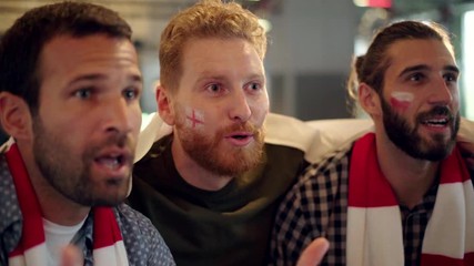 Excited supporters exulting after victory