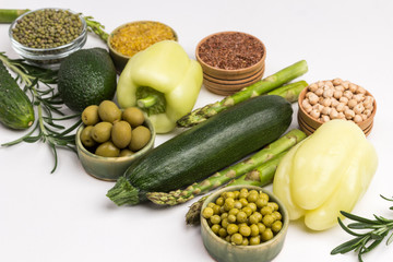 Healthy food for diet and lifestyle: green vegetables, quinoa bulgur, chickpeas, flax almond. Alkaline foods set.