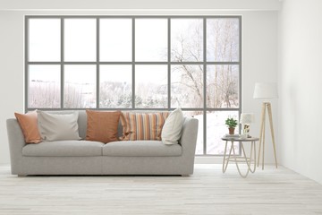 Stylish room in white color with sofa and winter landscape in window. Scandinavian interior design. 3D illustration