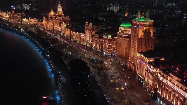 Aerial view Shanghai at night  The Bund, The Bund in Shanghai is a famous waterfront area in central Shanghai at night, China.