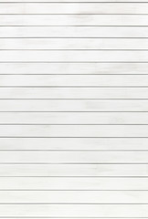 Obraz premium White wood background. Painted scraped wooden board. Bright texture pattern.