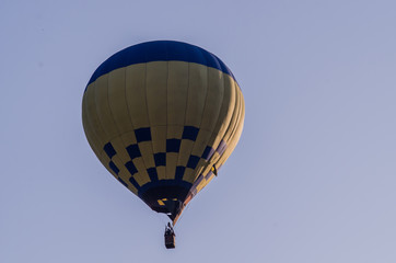 Fototapeta premium hot air balloon is flying at sunrise. romantic balloon flights