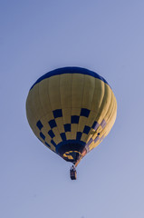 Fototapeta premium hot air balloon is flying at sunrise. romantic balloon flights