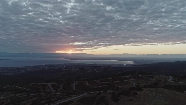 Tangled pathways of the abandoned park above Saloniki, Greece. Aerial, drone video. Summer. Sunset.