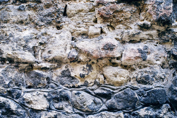 Old stone wall. Rough vintage background