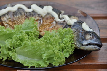 Funny fish with mayonnaise