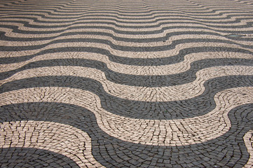 Traditional cobblestone pavement, Rossio (King Pedro IV Square), Lisbon, Portugal.