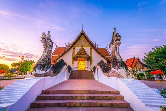 Wat Phumin, Buddhist temple with colorful morning sunrise sky, one of the most famous tourist attraction in Nan Province, North of Thailand.