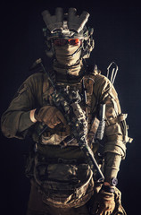 Anti-terrorist squad fighter, army elite forces soldier in combat uniform and tactical ammunition,...