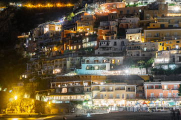 Colorful houses of Positano along Amalfi coast at night, Italy. Night landscape.