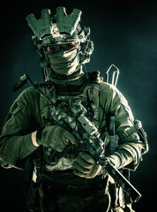 Anti-terrorist squad fighter, army elite forces soldier in combat uniform and tactical ammunition,...