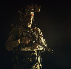 Half length, low key portrait of elite commando fighter, professional mercenary hiding identity...