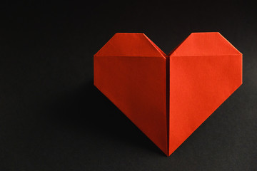 origami heart red paper symbol on black