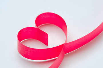 heart from red ribbon on white background. romantic love concept. valentines day for birthday,...