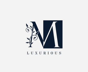 M Letter Luxury Vintage Logo. Dark Blue and White Minimalist L With Classy Leaves Shape design perfect for fashion, Jewelry, Beauty Salon, Cosmetics, Spa, Hotel and Restaurant Logo. 
